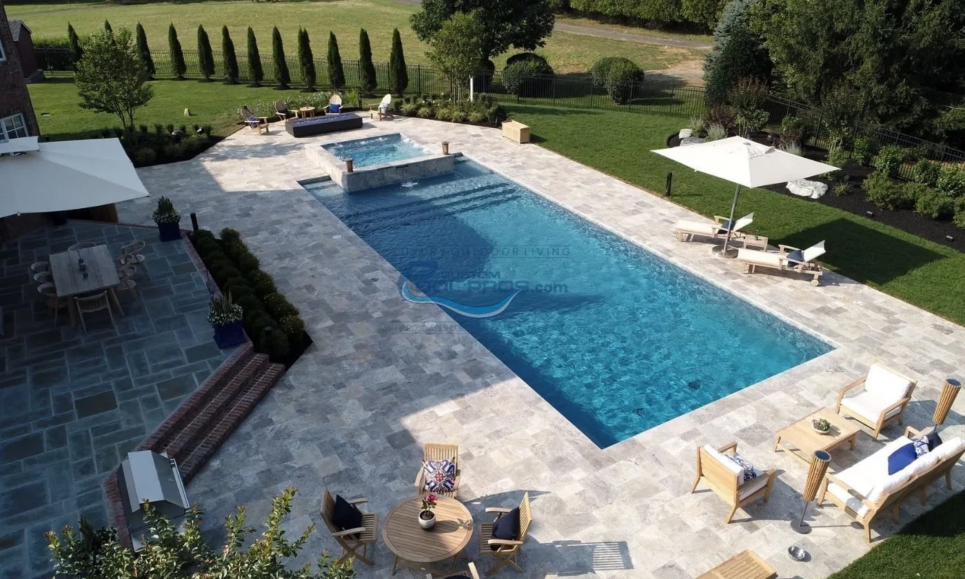large inground pool with spa italian style installation pool deck with travertine tile installation