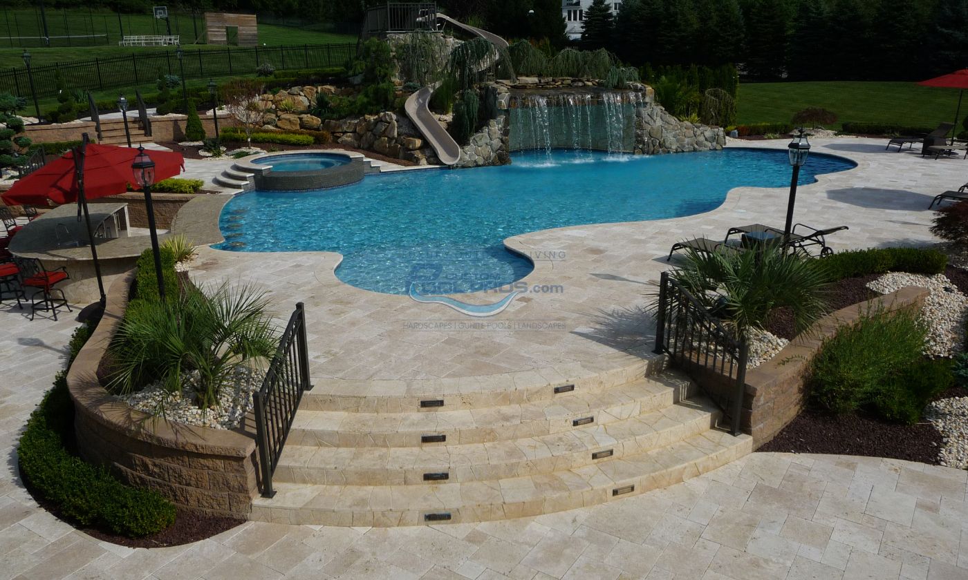 custom gunite pool with grotto and slide installation in NJ