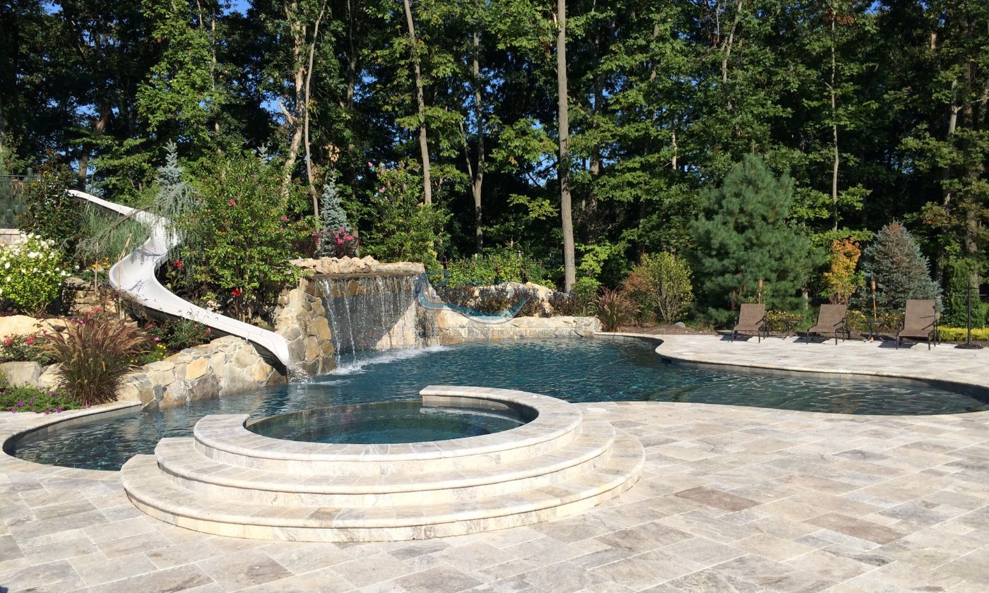 gunite pool with custom slide and raised circular spa in NJ